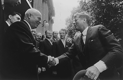 JFK Nikita hand shake. 